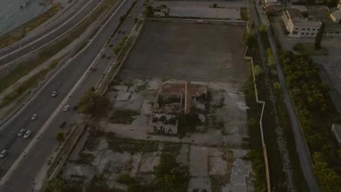 Aerial View of a abandoned area located nearby the sea. Stock Footage 345223789
