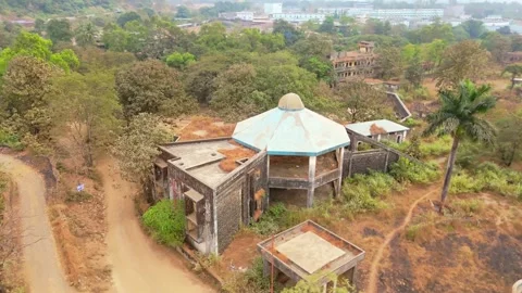 Aerial View of abandoned building with hexagonal roof Stock Footage 299784989
