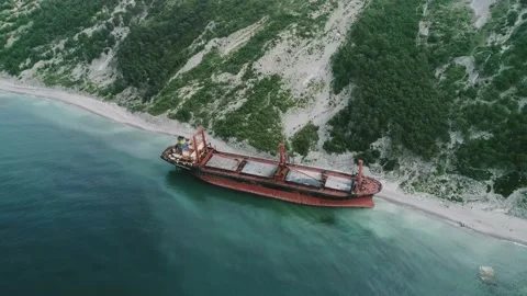 Aerial view of abandoned cargo ship. Bulk carrier ran aground after the storm Stock Footage 223533583