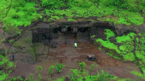 Aerial View of an Abandoned Cave in Lush Green Mountains During Monsoon Stock Footage 342701526