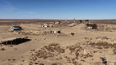 Aerial view of an abandoned ghost Aral town in the desert, Kazakhstan Stock Footage 323008025