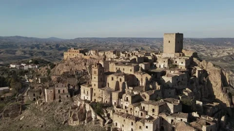 Aerial view of the abandoned ghost town of Craco in Basilicata, Italy. 4K Stock Footage 304668074