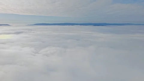 Aerial View Above Clouds and Fog with Andes Mountain Cordillera Horizon Chile Vidéo 334524997