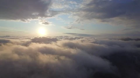 Aerial view above the clouds Stock Footage 63475311