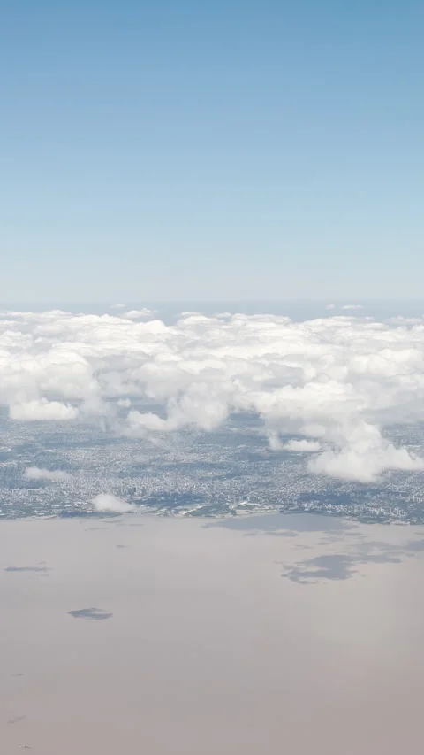 Aerial View Above Clouds Over Urban Landscape Stock Footage 331375661