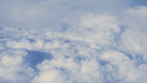 Aerial view above clouds from plane Stock Footage 104152164