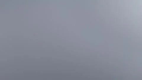 Aerial View Above Clouds Under Blue Sky and Sunlight in 4K Vídeo Stock 337539112