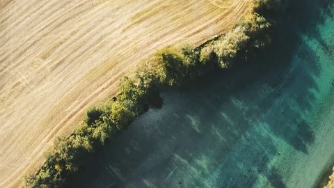 Aerial view above fields and river landscape in Norway agriculture Stock Footage 120281935