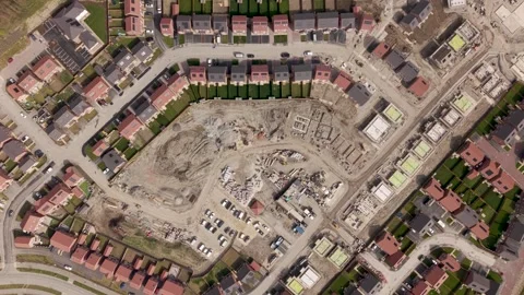 Aerial view above new build houses on a construction site Video stock 333207294