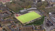 Aerial View Above Players On A Soccer Field In An Urban Area Of London, Uk. Stock Footage