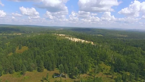 AERIAL: View from above on the quarry for the mining of limestone Stock-Footage 78033320