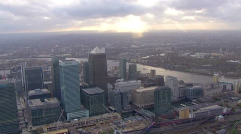 Aerial view above the towers of London's financial district, Canary Wharf Stock Footage