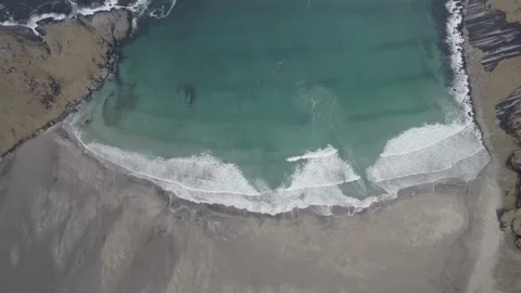 Aerial view above waves at the Bunes beach, in gloomy Lofoten, Norway - Video stock 169426322