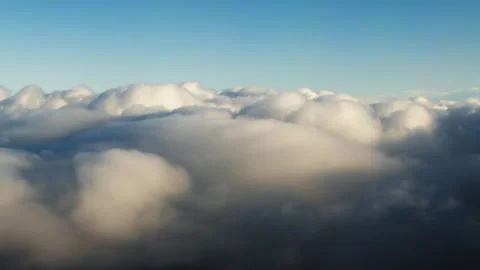 Aerial View Above White Clouds in Blue Sky Vídeo Stock 331224405
