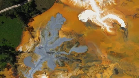 Aerial view of abstract mining pattern, nature pollution, decanting lake Stock Footage 345655348