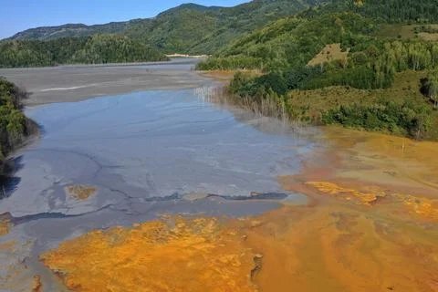 Aerial view of abstract mining pattern, nature pollution, colorful decantin.. Stock Photos