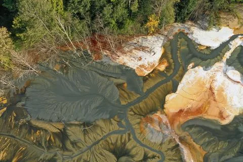 Aerial view of abstract mining pattern, nature pollution, colorful decantin.. Stock Photos