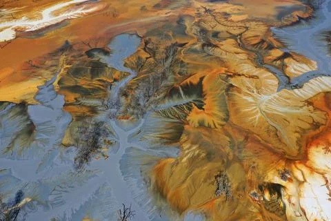 Aerial view of abstract mining pattern, nature pollution, colorful decantin.. Stock Photos