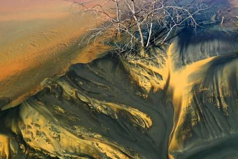 Aerial view of abstract mining pattern, nature pollution, colorful decantin.. Stock Photos
