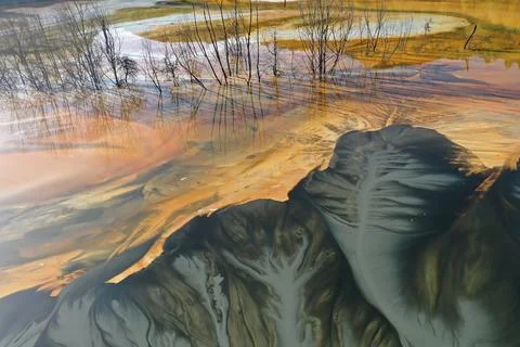 Aerial view of abstract mining pattern, nature pollution, colorful decantin.. Stock Photos