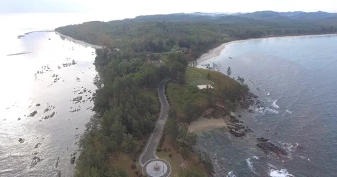 Aerial view of Abstract ocean waves crashing on rocky shoreline Stock Footage 95082633