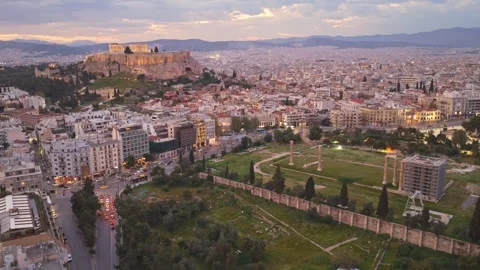 Aerial view of acropolis and temple of olympian zeus in athens at dusk Stock Footage 333925844