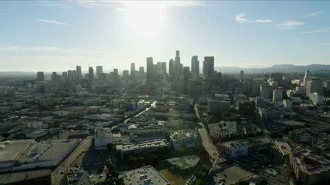 Aerial view across Skid Row to LA skyscr... | Stock Video | Pond5