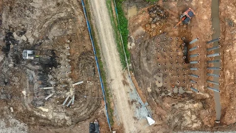 Aerial View of Active Bored Pile Foundation Drilling and Site Preparation Stock Footage 340178221