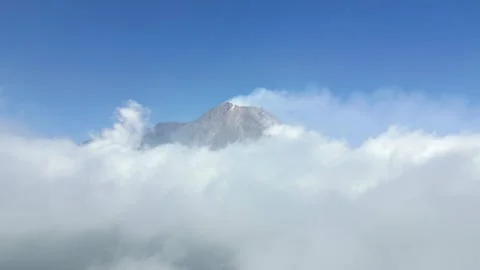 Aerial View Of Active Merapi Volcano Above The Clouds In The Blue Sky, Indonesia Stock Footage 280375459