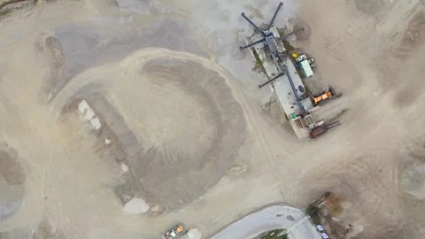 Aerial view of active sand quarry in industrial zone in foggy autumn Bavaria Stock Footage 295236972