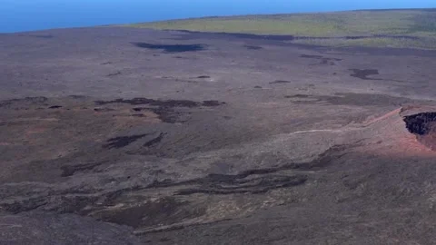 Aerial View of an Active Volcano Crater Near to Coast Stock Footage 130358889
