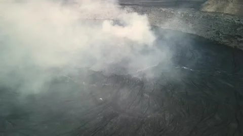 Aerial view of active volcano smoking, Erta Ale, Ethiopia. Cinematic drone shot Stock Footage 270190031