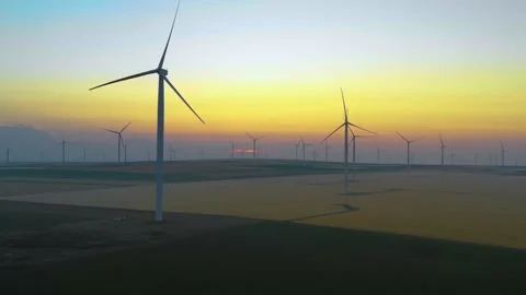 Aerial view of aeolian generators wind turbine farm in a wheat field Wind energy Stock Footage 150591002