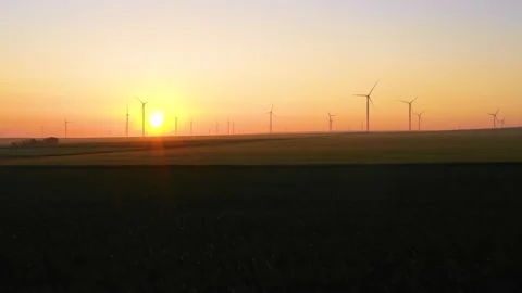 Aerial view of aeolian generators wind turbine farm in a wheat field Wind energy Video stock 150591417