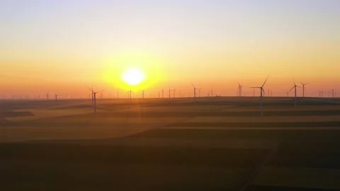 Aerial view of aeolian generators wind turbine farm in a wheat field Wind energy Stock-Footage 150591749