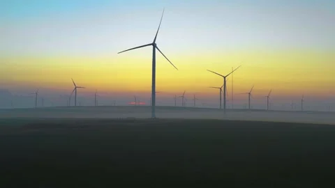 Aerial view of aeolian generators wind turbine farm in a wheat field Wind energy Stock Footage 150622891