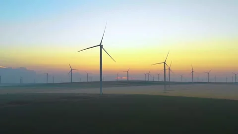Aerial view of aeolian generators wind turbine farm in a wheat field Wind energy Stock Footage 150622947