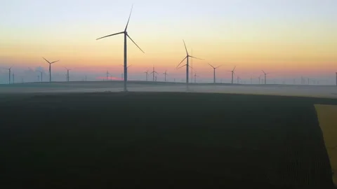 Aerial view of aeolian generators wind turbine farm in a wheat field Wind energy 스톡 동영상 150623020