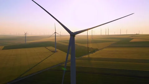 Aerial view of aeolian generators wind turbine farm in a wheat field Wind energy Stock-Footage 150625499