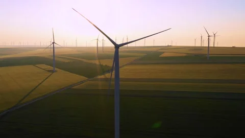 Aerial view of aeolian generators wind turbine farm in a wheat field Wind energy Stock Footage 150625665