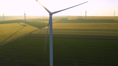 Aerial view of aeolian generators wind turbine farm in a wheat field Wind energy Video stock 150625916