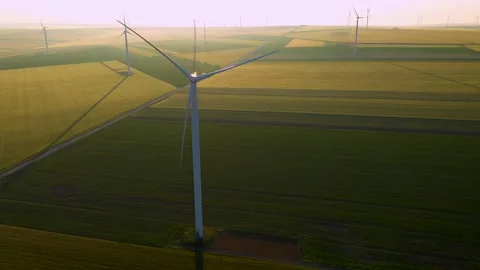 Aerial view of aeolian generators wind turbine farm in a wheat field Wind energy Stock Footage 150626143
