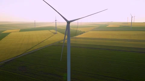 Aerial view of aeolian generators wind turbine farm in a wheat field Wind energy Stock-Footage 150626390