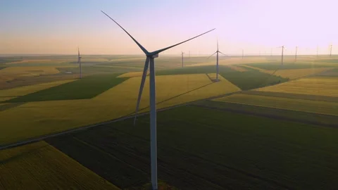 Aerial view of aeolian generators wind turbine farm in a wheat field Wind energy Stock-Footage 150626524
