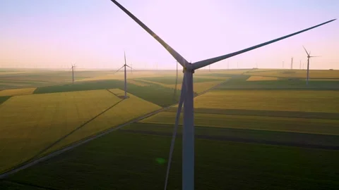 Aerial view of aeolian generators wind turbine farm in a wheat field Wind energy Stock Footage 150626702