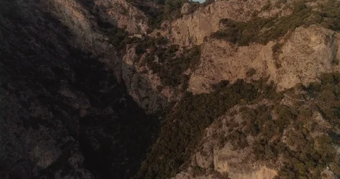 Aerial view of the Af Kule Monastery embdedded in the steep rock of Fethiye. Stock Footage 93254436