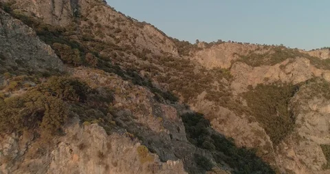 Aerial view of the Af Kule Monastery embdedded in the steep rock of Fethiye. Stock Footage 93254557