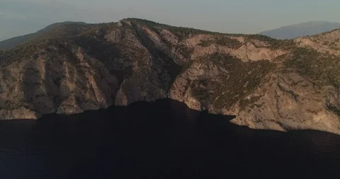 Aerial view of the Af Kule Monastery embdedded in the steep rock of Fethiye. Stock Footage 93254991