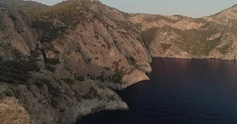 Aerial view of the Af Kule Monastery embdedded in the steep rock of Fethiye. Stock Footage 93255126