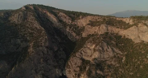 Aerial view of the Af Kule Monastery embdedded in the steep rock of Fethiye. Stock Footage 93255475
